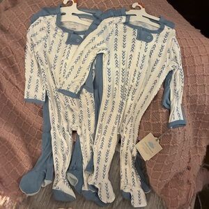 NWT bundle of two sets (four total sleepers ) Blue/White Sleepers.size 6-9 mo